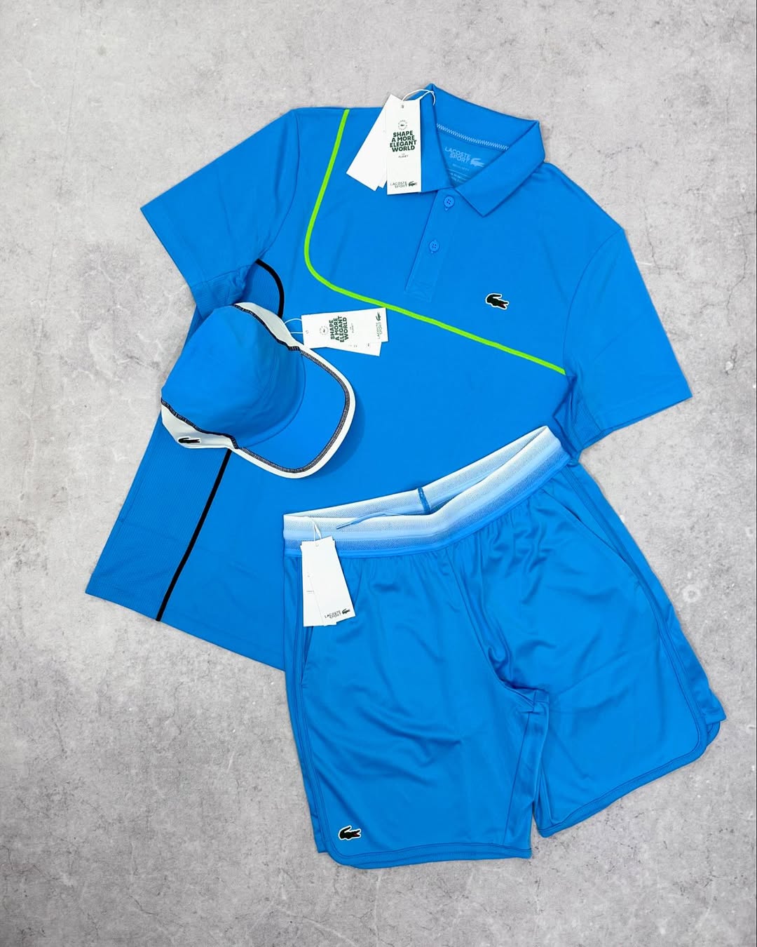 ENSEMBLE LACOSTE BLEU (CHEMISE+SHORT+CASQUETTE)